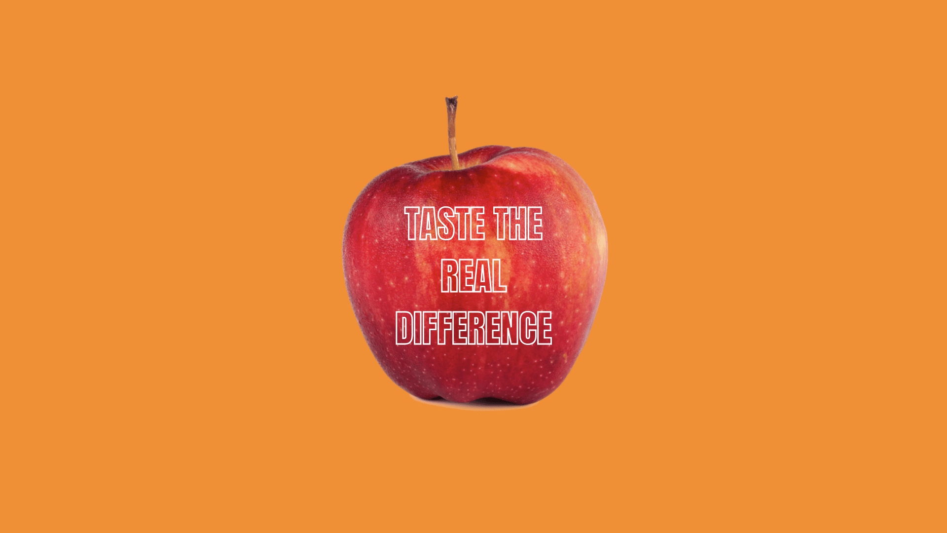 An apple with the words 'taste the real difference' on it. a play on Sainsbury's slogan.